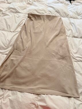 So on trend, champagne midi silk skirt